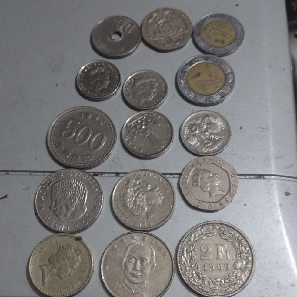 Diverse Coin Collection with Silver (.63 Oz)